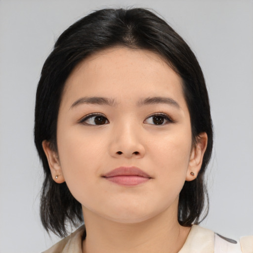 Neutral asian young-adult female with medium  brown hair and brown eyes