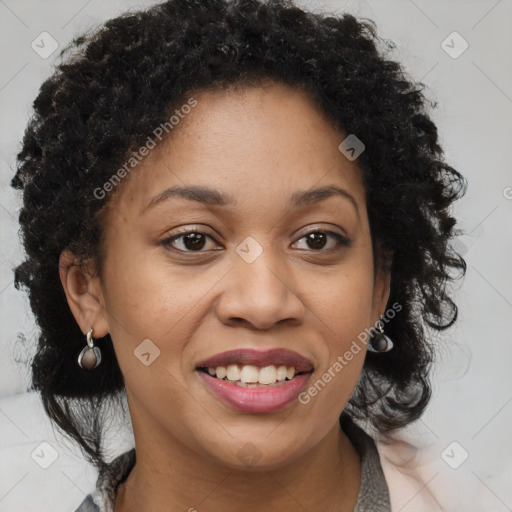 Joyful black young-adult female with long  brown hair and brown eyes