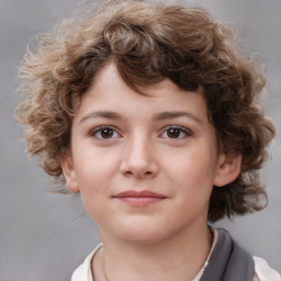 Joyful white child female with medium  brown hair and brown eyes