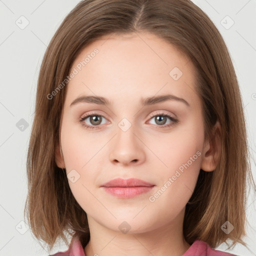 Neutral white young-adult female with long  brown hair and brown eyes