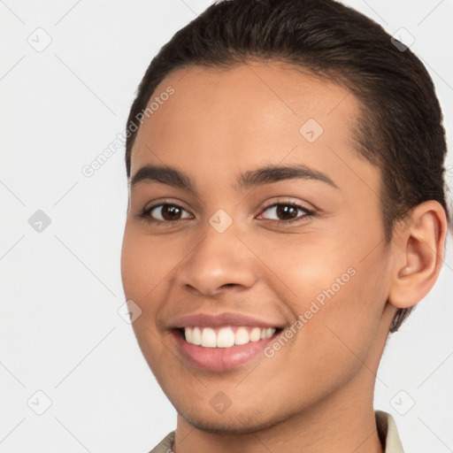 Joyful white young-adult female with short  brown hair and brown eyes