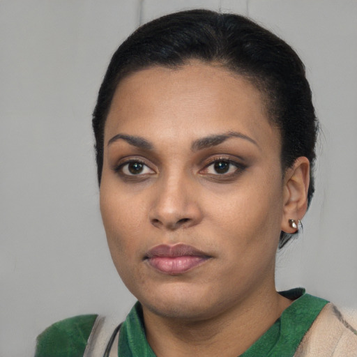 Neutral latino young-adult female with short  black hair and brown eyes