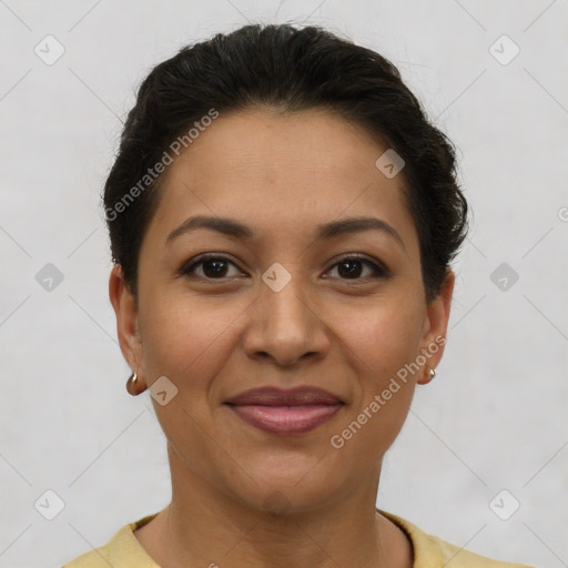 Joyful latino young-adult female with short  brown hair and brown eyes