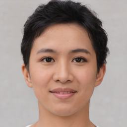 Joyful asian young-adult female with short  brown hair and brown eyes