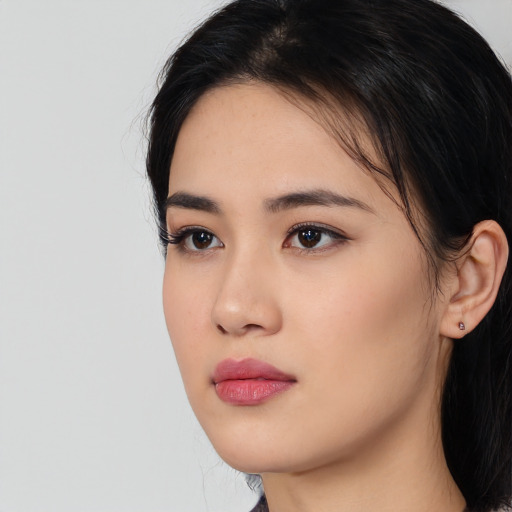 Neutral asian young-adult female with long  black hair and brown eyes