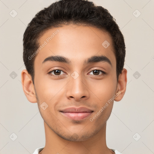 Joyful latino young-adult male with short  brown hair and brown eyes