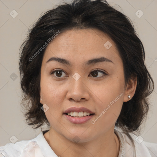 Joyful asian young-adult female with medium  brown hair and brown eyes