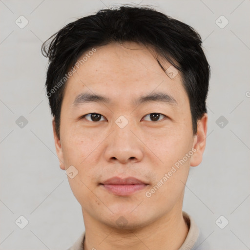 Neutral asian young-adult male with short  black hair and brown eyes