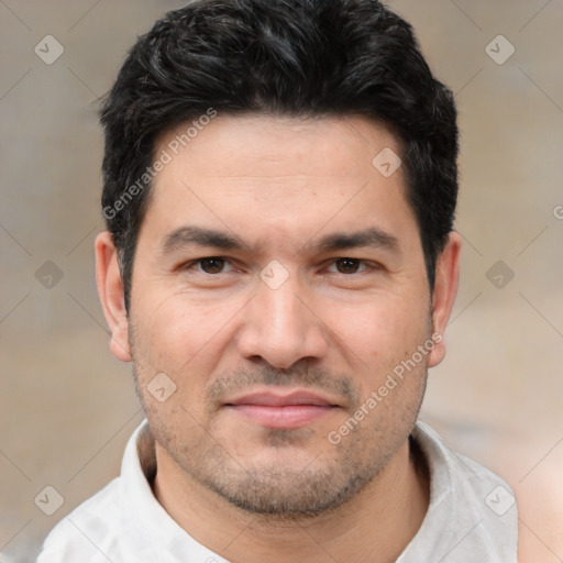 Joyful white adult male with short  black hair and brown eyes