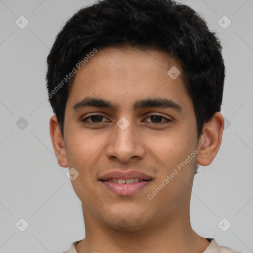 Joyful latino young-adult male with short  black hair and brown eyes