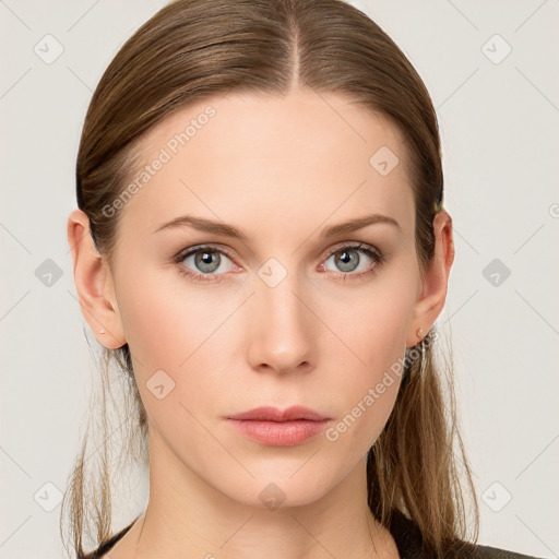 Neutral white young-adult female with long  brown hair and blue eyes