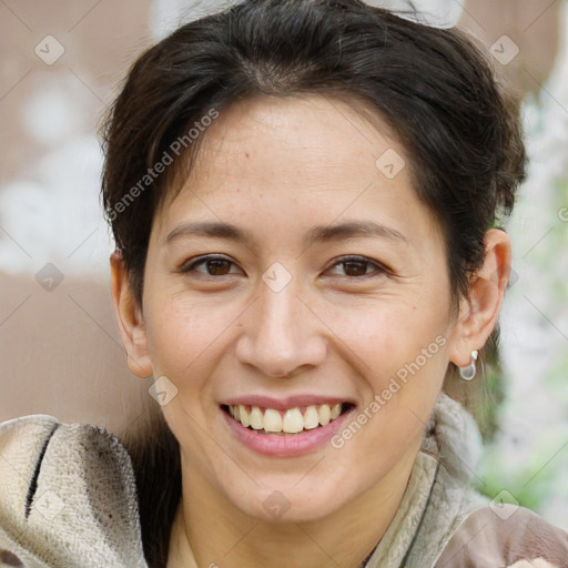 Joyful white adult female with short  brown hair and brown eyes