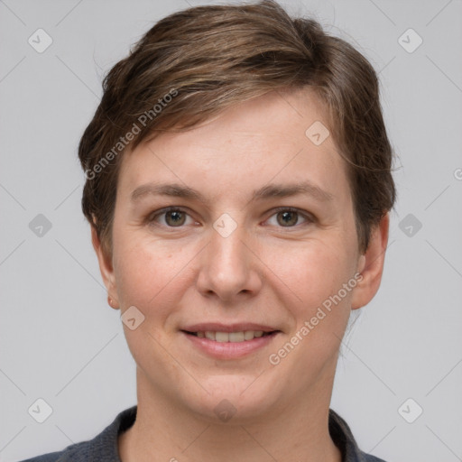 Joyful white young-adult female with short  brown hair and grey eyes