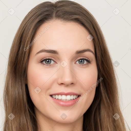 Joyful white young-adult female with long  brown hair and green eyes