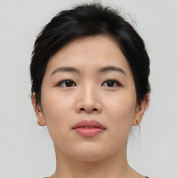 Neutral asian young-adult female with medium  brown hair and brown eyes