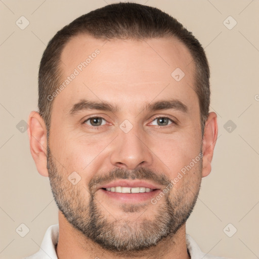 Joyful white adult male with short  brown hair and brown eyes