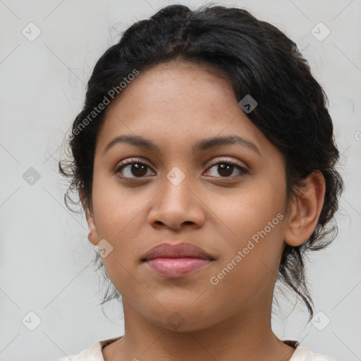 Joyful latino young-adult female with medium  brown hair and brown eyes