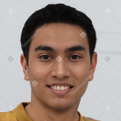 Joyful latino young-adult male with short  black hair and brown eyes