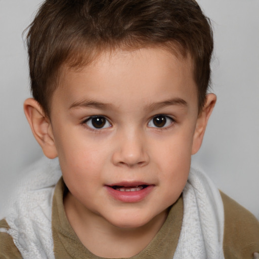 Joyful white child male with short  brown hair and brown eyes