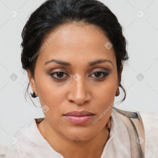 Joyful latino young-adult female with medium  brown hair and brown eyes