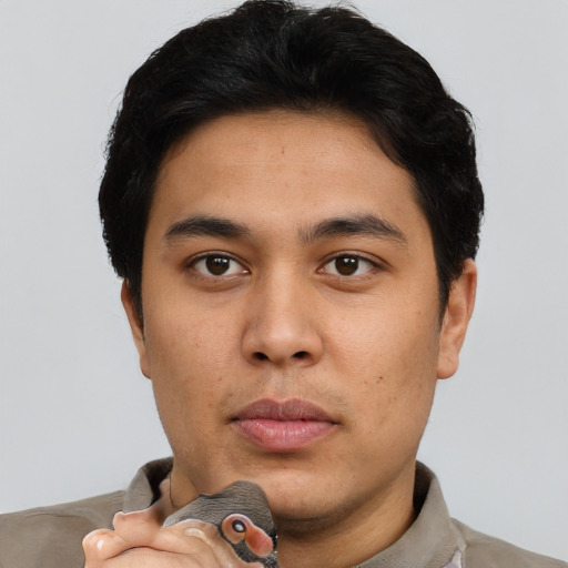 Neutral white young-adult male with short  black hair and brown eyes
