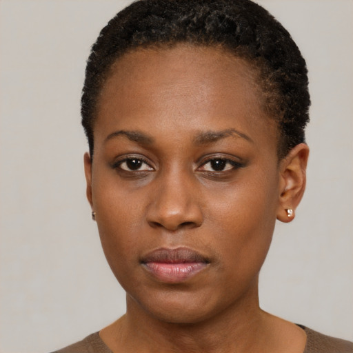 Neutral black young-adult female with short  brown hair and brown eyes