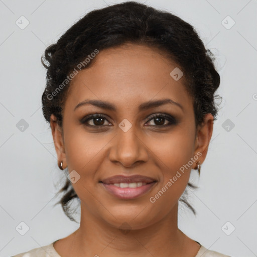 Joyful latino young-adult female with short  brown hair and brown eyes