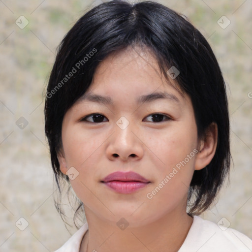 Joyful asian young-adult female with medium  black hair and brown eyes