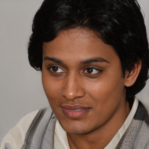 Neutral black young-adult female with short  black hair and brown eyes