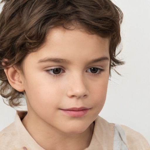 Joyful white child male with medium  brown hair and brown eyes