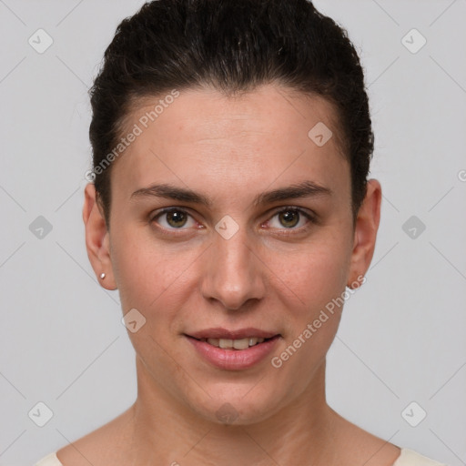 Joyful white young-adult female with short  brown hair and brown eyes