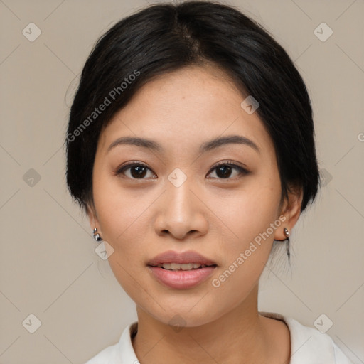 Joyful asian young-adult female with medium  black hair and brown eyes