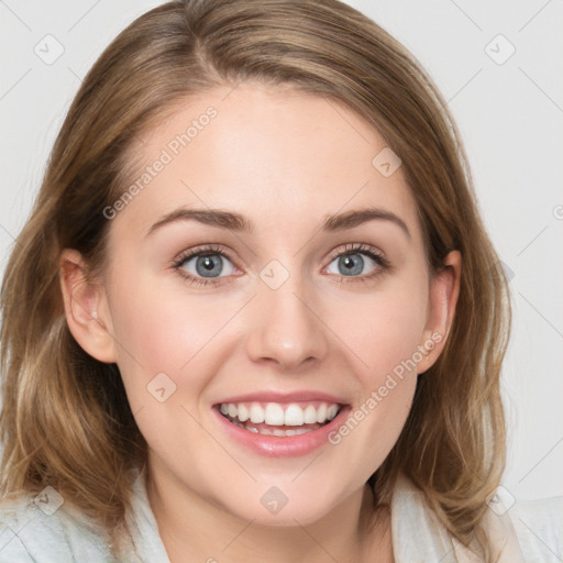 Joyful white young-adult female with medium  brown hair and blue eyes