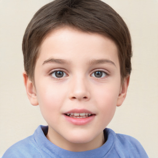 Joyful white child male with short  brown hair and brown eyes