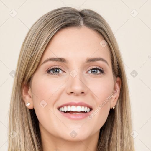 Joyful white young-adult female with long  brown hair and green eyes