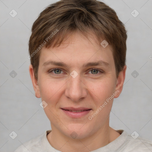 Joyful white young-adult female with short  brown hair and grey eyes