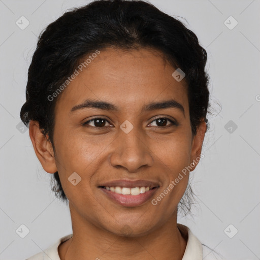 Joyful latino young-adult female with short  black hair and brown eyes