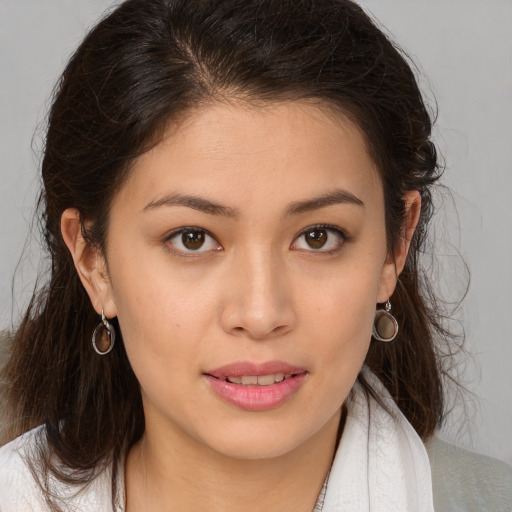Joyful white young-adult female with medium  brown hair and brown eyes