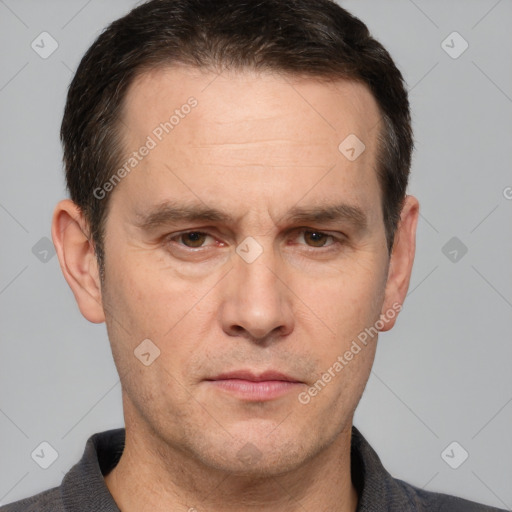 Neutral white adult male with short  brown hair and brown eyes