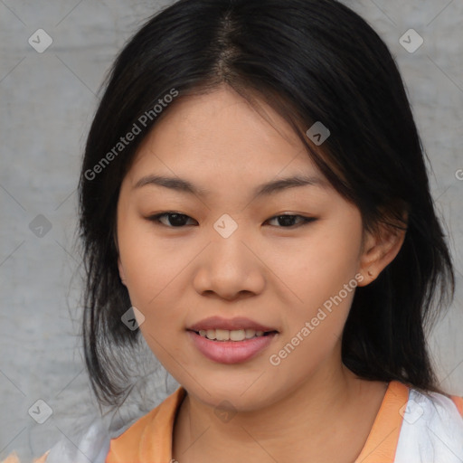 Joyful asian young-adult female with medium  black hair and brown eyes