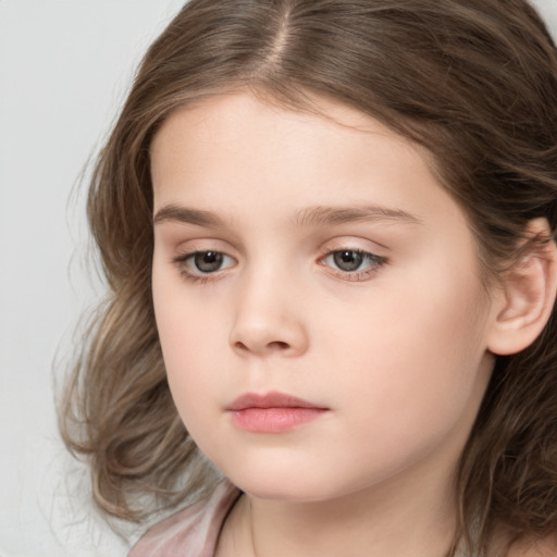 Neutral white child female with medium  brown hair and brown eyes