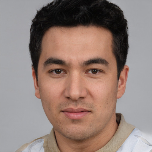 Neutral white young-adult male with short  black hair and brown eyes