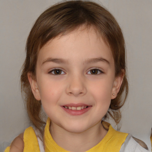 Joyful white child female with medium  brown hair and brown eyes