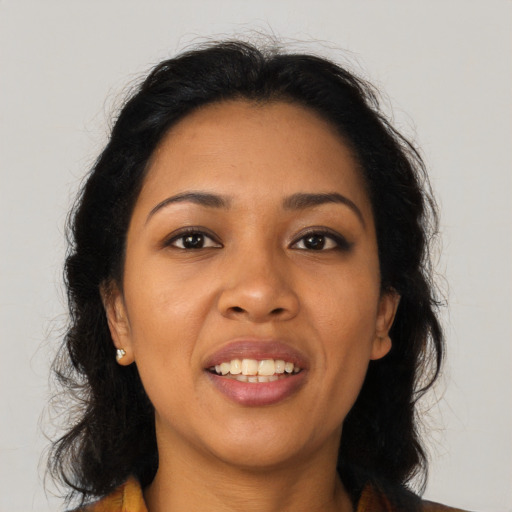 Joyful asian young-adult female with long  brown hair and brown eyes