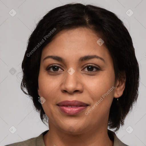 Joyful latino young-adult female with medium  brown hair and brown eyes