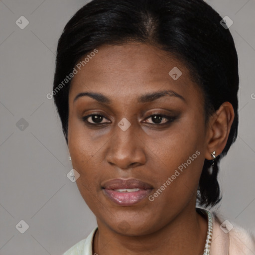 Joyful black young-adult female with medium  black hair and brown eyes