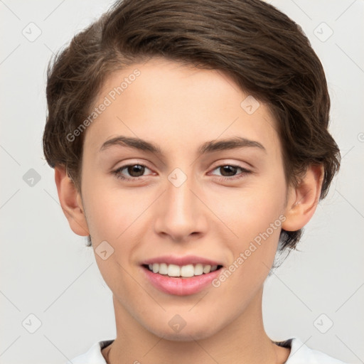 Joyful white young-adult female with short  brown hair and brown eyes