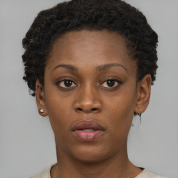 Neutral black young-adult female with short  brown hair and brown eyes