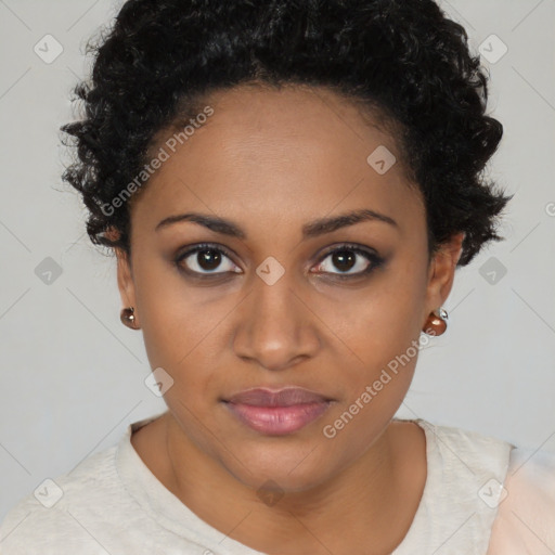 Joyful black young-adult female with short  brown hair and brown eyes