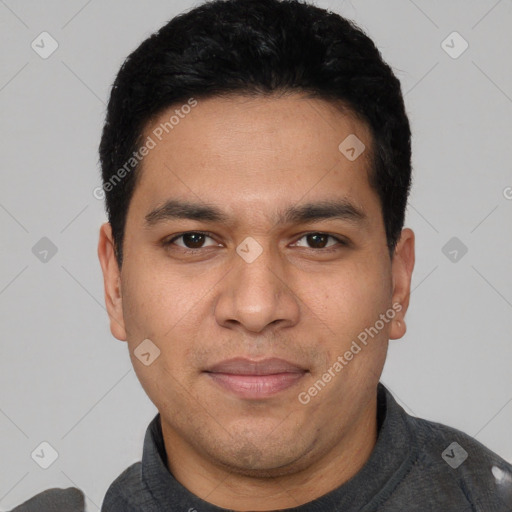 Joyful white young-adult male with short  black hair and brown eyes